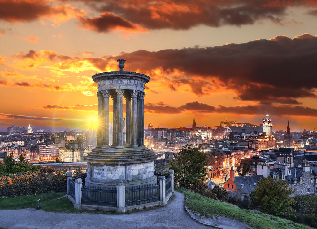 Edinburgh against sunset with Calton Hill in Scotland