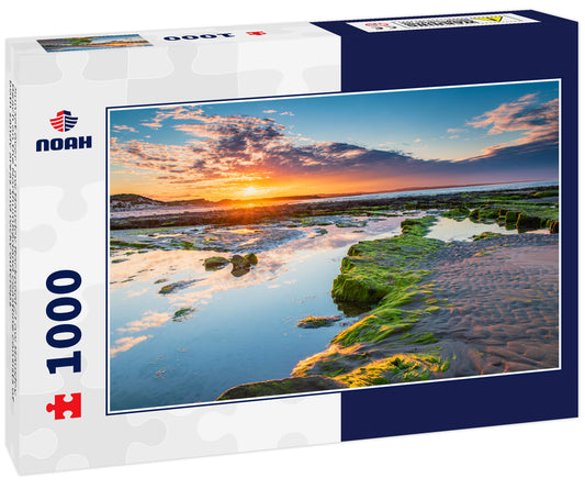 Sunset over Low Hauxley Rockpool / Low Hauxley Beach on the Northumberland coastline consists of both sandy areas and rocky outcrops