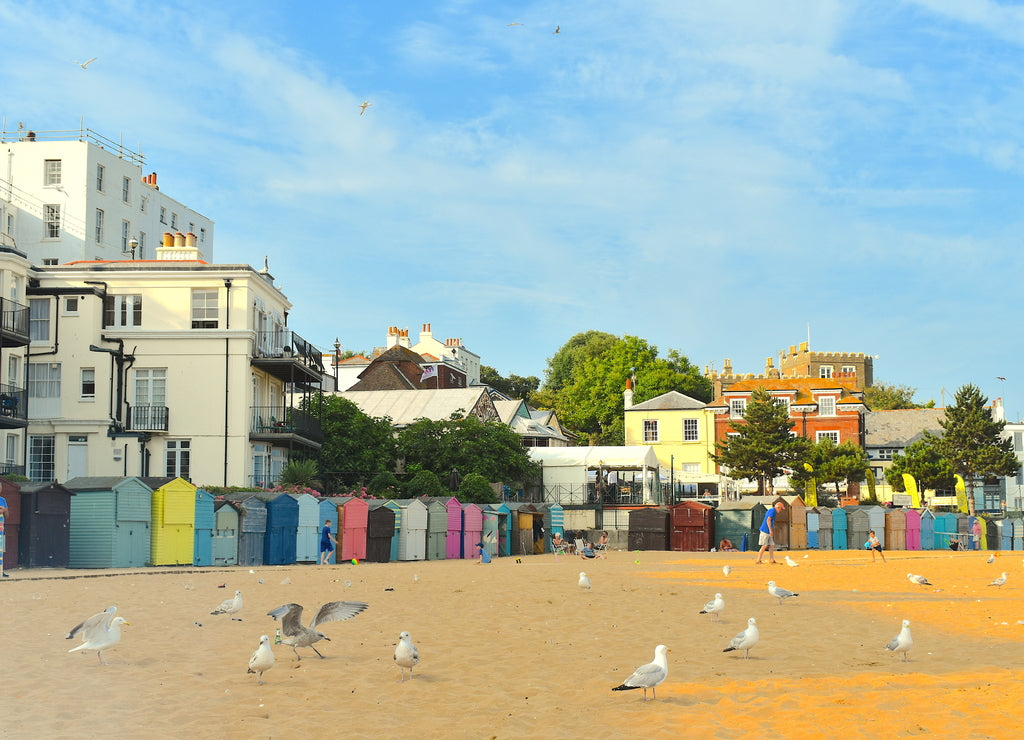 Colourful beach huts along the beach, Viking Bay, Broadstairs, Kent, UK