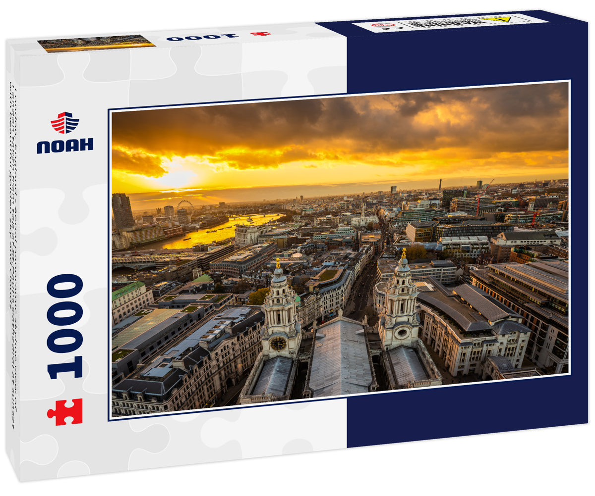 London, England - Aerial panoramic skyline view of London taken from top of St.Paul's Cathedral at sunset with beautiful golden sky and clouds