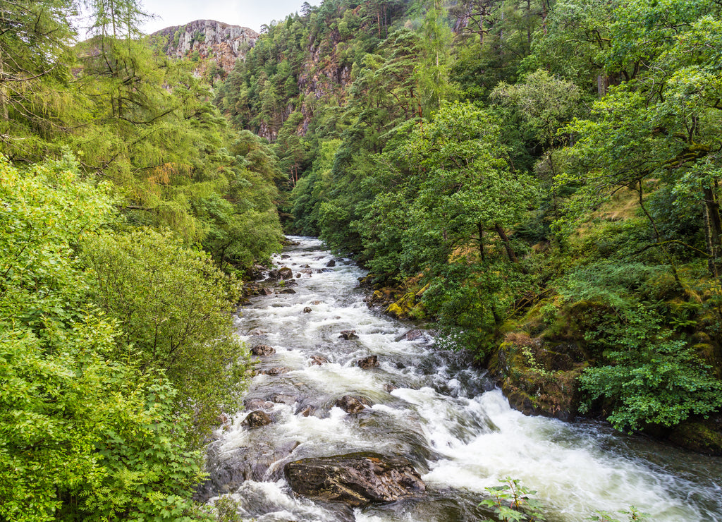 Glaslyn river running through Beddgelert valley in the heart of Smowdonia National Park in Gwynedd, Wales, UK