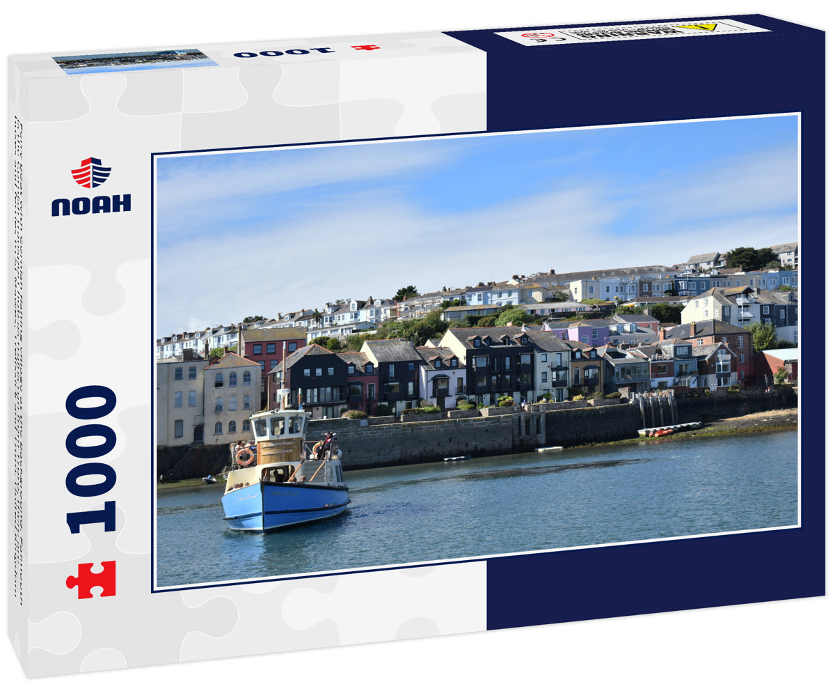 Ferry boat with Cornish fishing village at the background. Falmouth is the Cornish transport hub as trains run from Truro, there are buses and ferries to St Mawes, Trelissick and Truro. United Kingdom