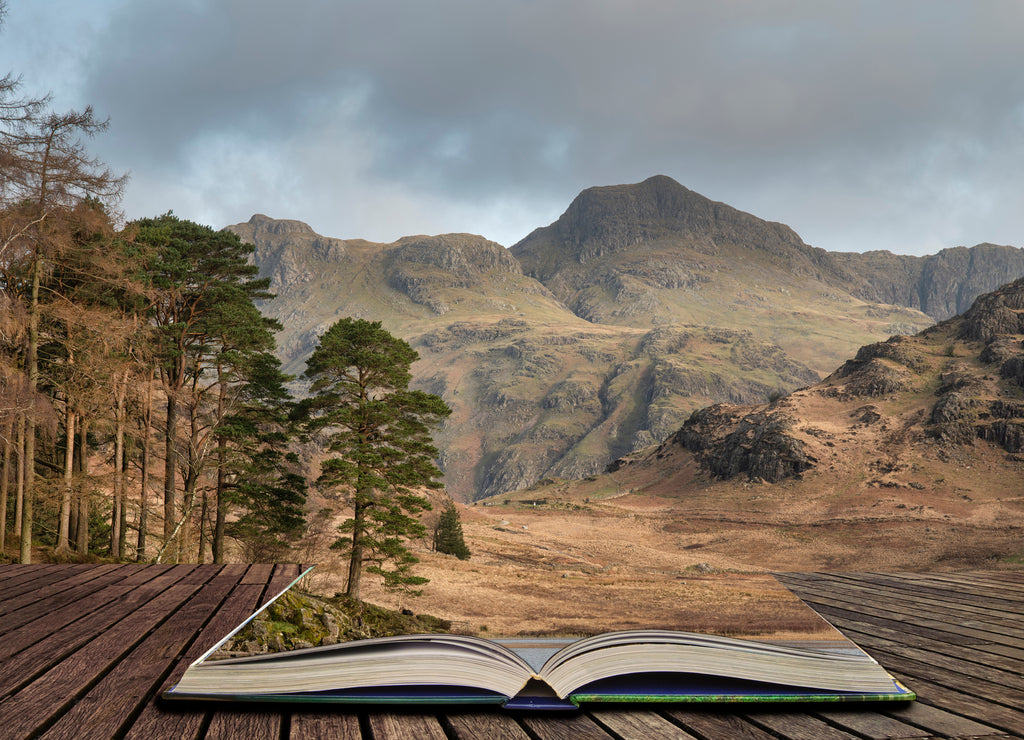Beautiful vibrant sunrise landscape image of Blea Tarn in UK Lake District coming out of pages in story book