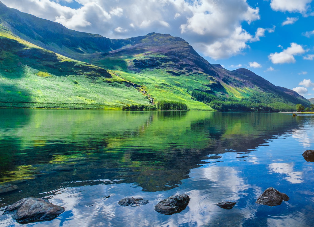 Mountains reflected on a lake at the beautiful Lake District in England