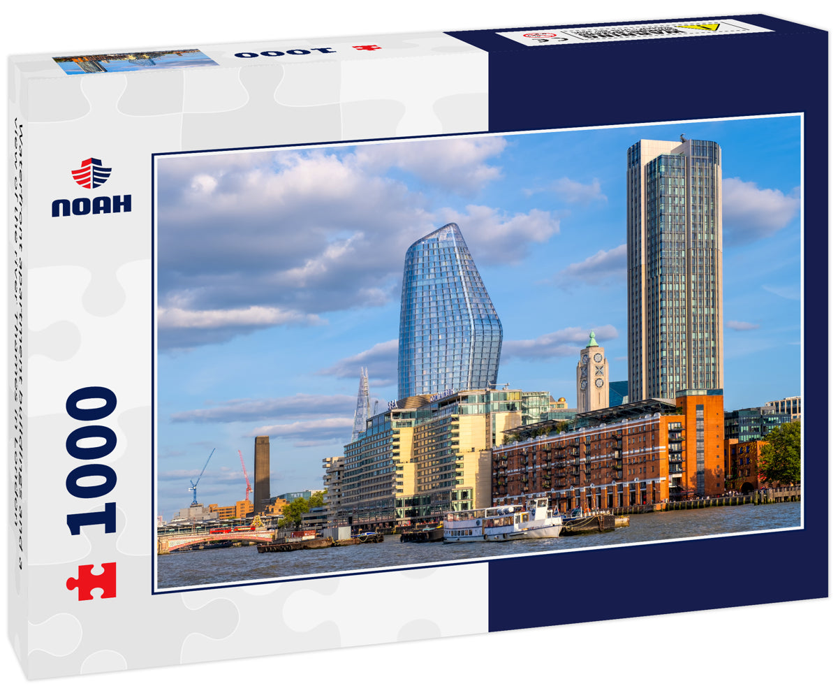 Waterfront apartment buildings and a view of the river Thames in London