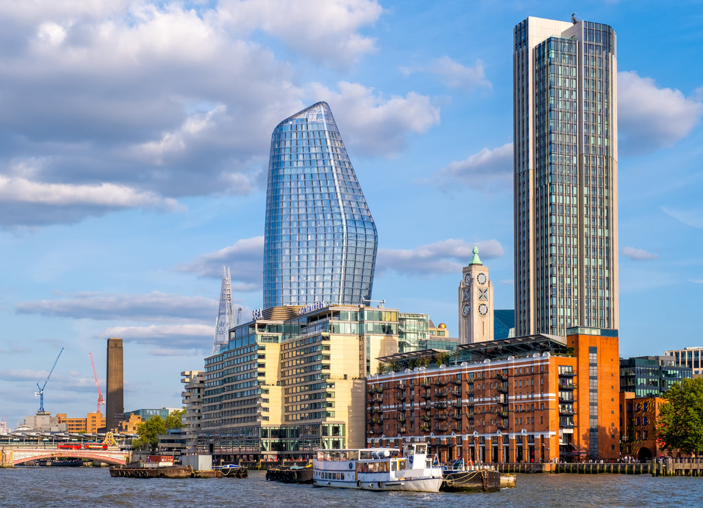 Waterfront apartment buildings and a view of the river Thames in London