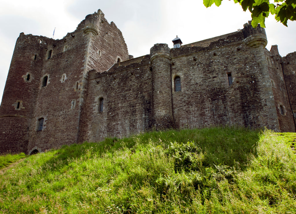 Doune Castle is a medieval stronghold near the village of Doune, central Scotland. is sited on a wooded bend where the Ardoch Burn flows into the River Teith