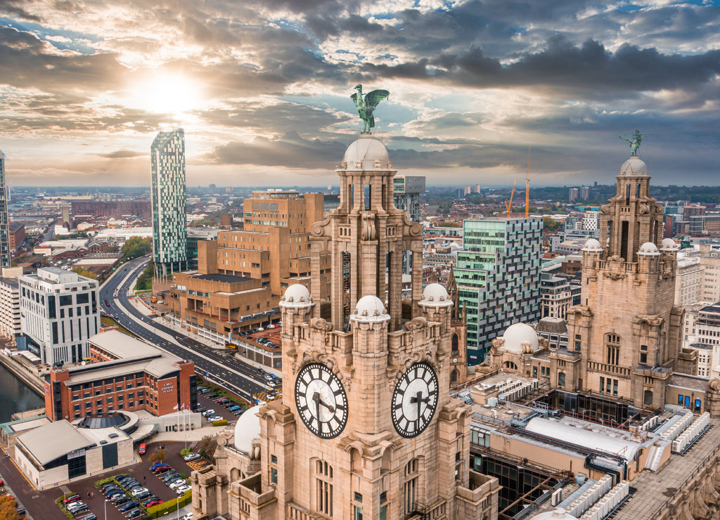 Aerial close up of the tower of the Royal Liver Building in Liverpool, UK during beautiful sunset