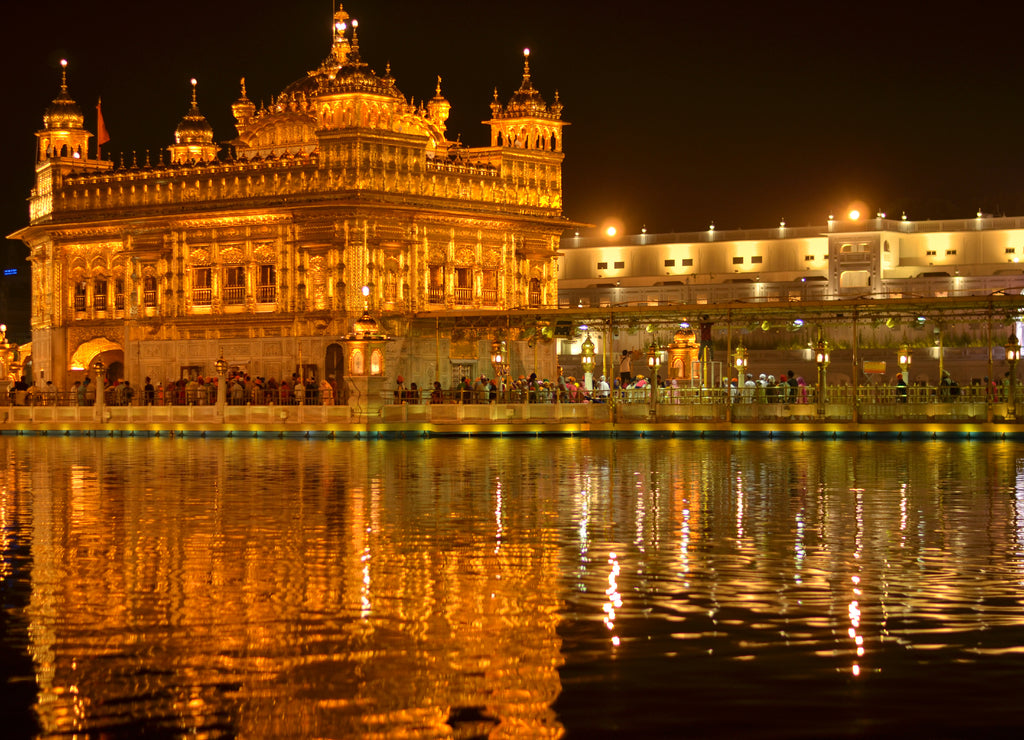 Golden Temple Amritsar Punjab Harmandir Sahib Gurdwara at Night View With Lights. Founded by Guru Nanak Dev, this is world's most holy sikh shrine, and one of the richest indian temples