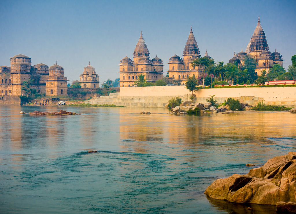 View of Royal cenotaphs (Chhatris) of Orchha over Betwa river. Orchha, Madhya Pradesh, India