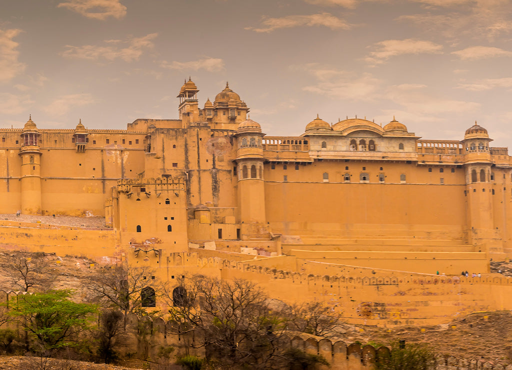 A view across Maotha lake towards the fort above the town in Jaipur, Rajasthan, India