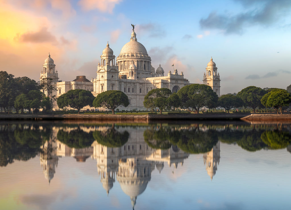 Victoria Memorial monument Kolkata at sunrise with water reflection