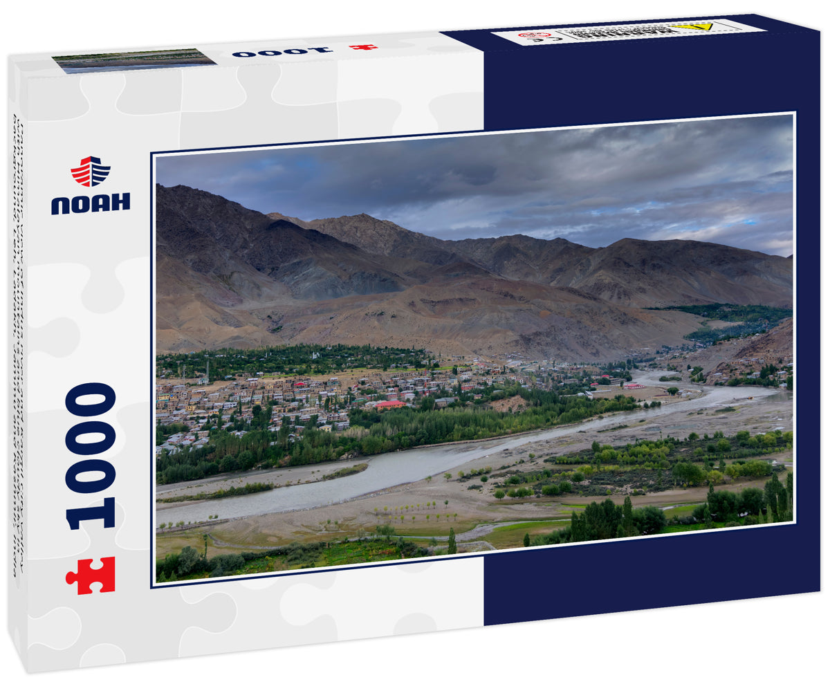 Panoramic view of Indus river and Kargil City valley with Himalayan mountains and blue cloudy sky in background, Leh, Ladakh, Jammu and Kashmir, India