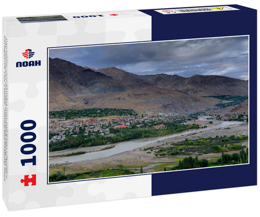 Panoramic view of Indus river and Kargil City valley with Himalayan mountains and blue cloudy sky in background, Leh, Ladakh, Jammu and Kashmir, India