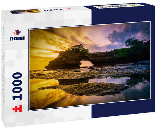 Tanah Lot Temple on sea at sunset in Bali Island, Indonesia