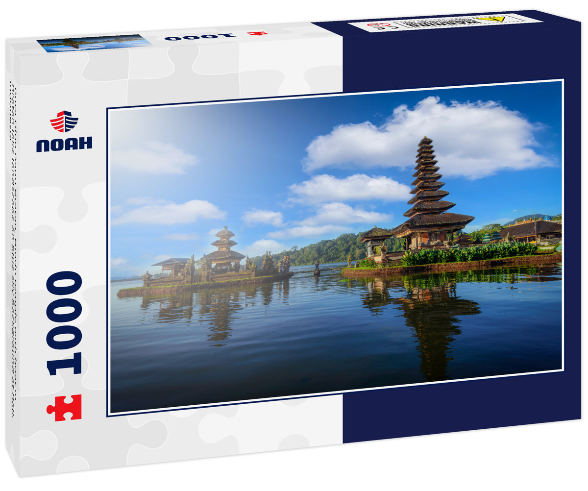 Pura Ulun Danu Bratan, Hindu temple with boat in Bratan lake landscape on blue sky background at Bali, Indonesia