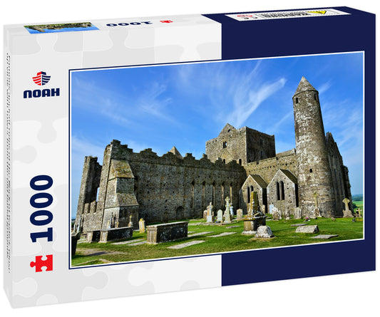 Famous ancient ruins of the Rock of Cashel. Close up view with tower from the old burial grounds