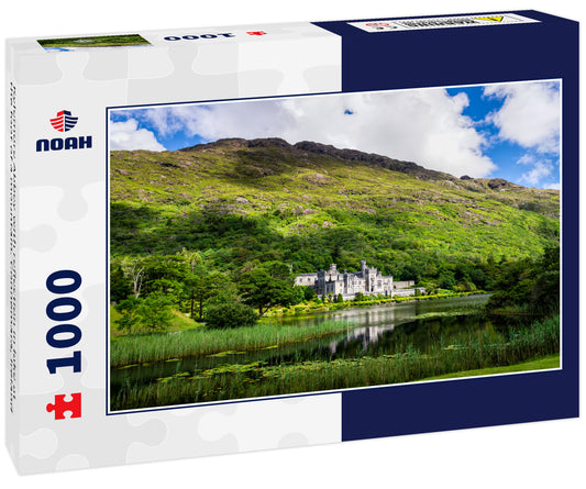 Kylemore Abbey with reflection in lake at the foot of a mountain. Connemara, Ireland