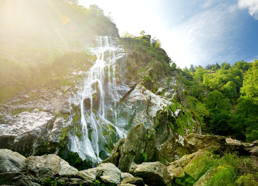 Majestic water cascade of Powerscourt Waterfall, the highest waterfall in Ireland. Tourist atractions in co. Wicklow, Ireland
