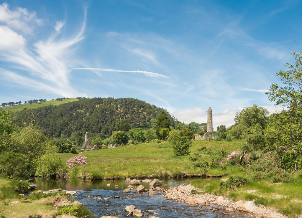 Saint Kevin's Church and the Round Tower nestled in the beautiful woodland at Glendalough, Co. Wicklow, Ireland