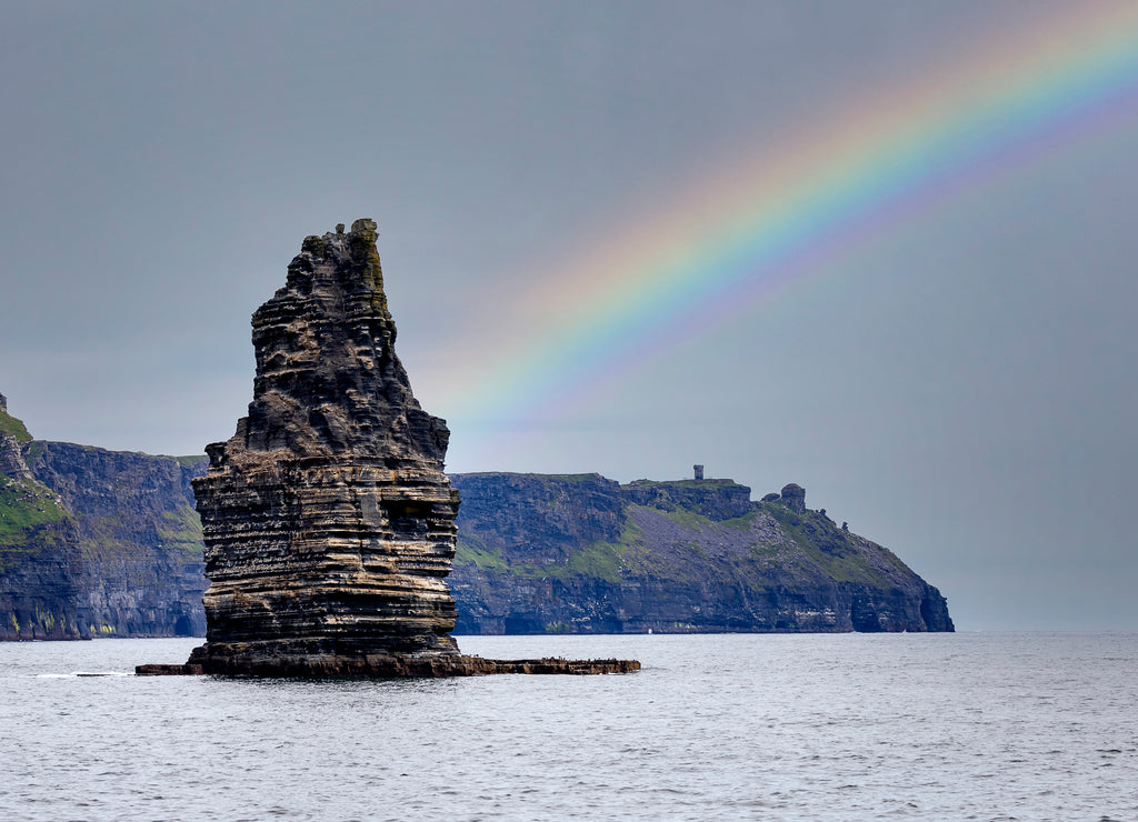 Ireland countryside tourist attraction in County Clare. The Cliffs of Moher and castle Ireland. Epic Irish Landscape UNESCO Global Geopark the wild atlantic way