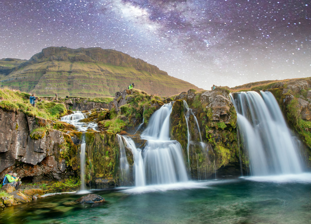Famous travel location in Iceland. Kirkjufell Waterfalls at night
