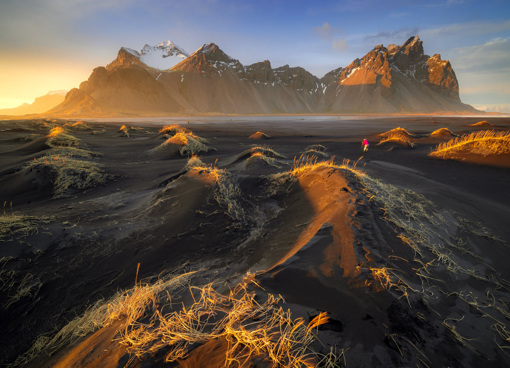 Vestrahorn mountain with black volcanic lava sand dunes at sunset, Stokksnes, Iceland