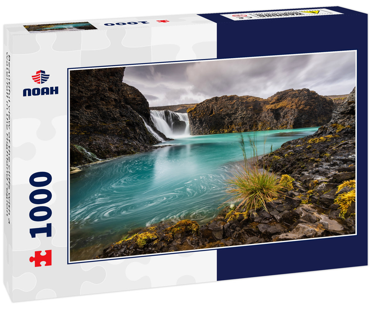 Beautiful view of the cliffs with a waterfall in the Highland region