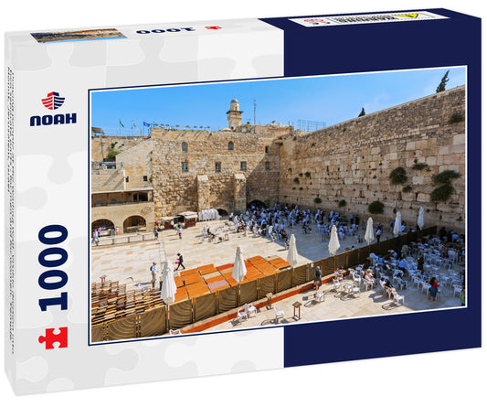 Praying people at the Wailing Wall. Visible division into two separate parts - for men and for women. Temple Mount, Jerusalem, Israel