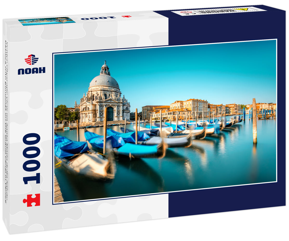 Venice cityscape view on Santa Maria della Salute basilica with gondolas on the Grand canal in Venice
