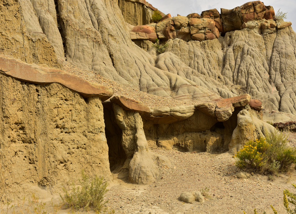 Erosion creates cracks and other interesting formations in badlands of North Dakota