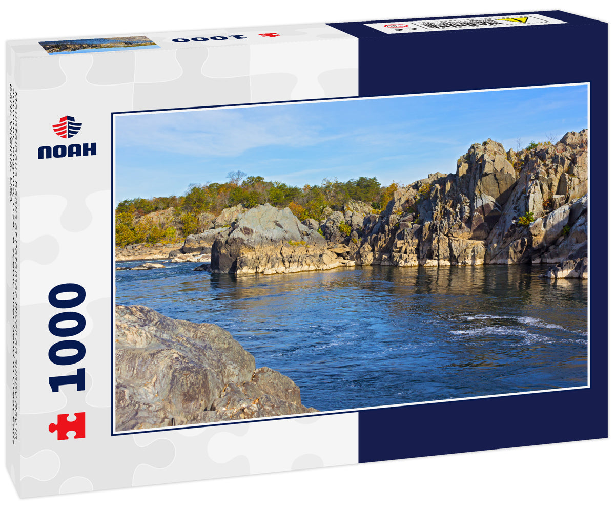 Mountainous banks of Potomac River on sunny day in autumn, Virginia, USA. A scenic river bend in Great Falls park, Virginia, USA