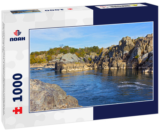 Mountainous banks of Potomac River on sunny day in autumn, Virginia, USA. A scenic river bend in Great Falls park, Virginia, USA