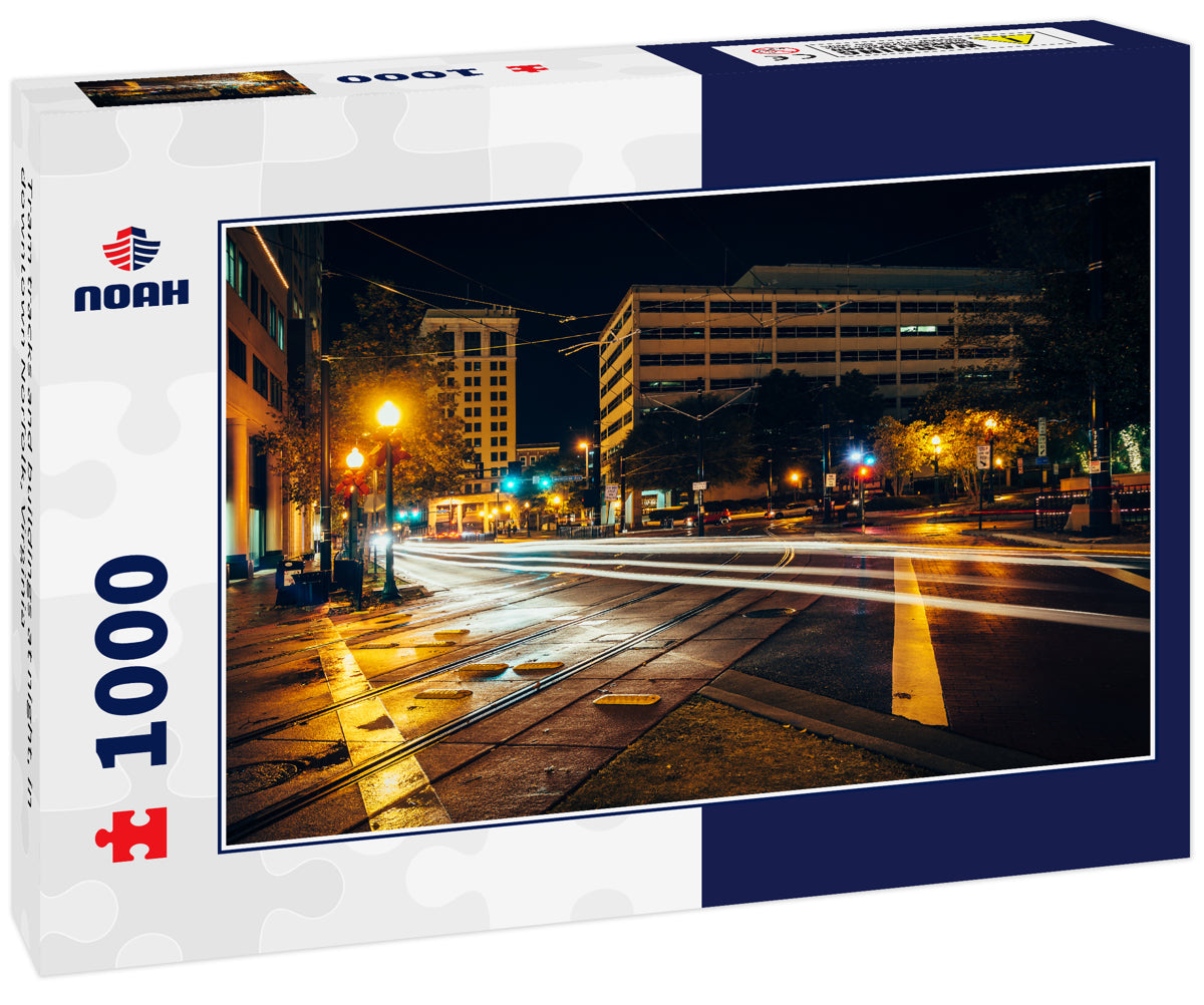 Tram tracks and buildings at night, in downtown Norfolk, Virginia