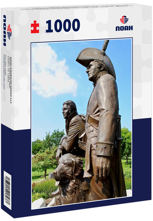 St. Charles, Missouri, USA: Lewis and Clark statue in Frontier Park near Missouri River. A bronze monument features Meriwether Lewis and William Clark and Clark's Newfoundland dog, Seaman