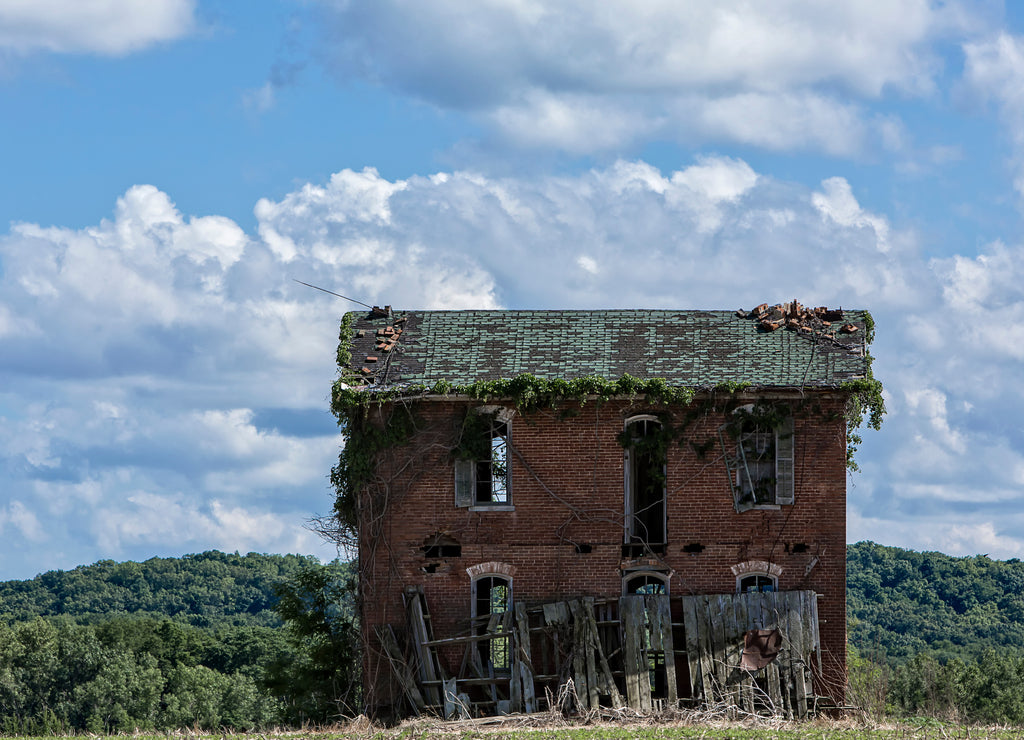 Old abandon farm house on Rt. 79, 5 miles north of Louisiana Missouri