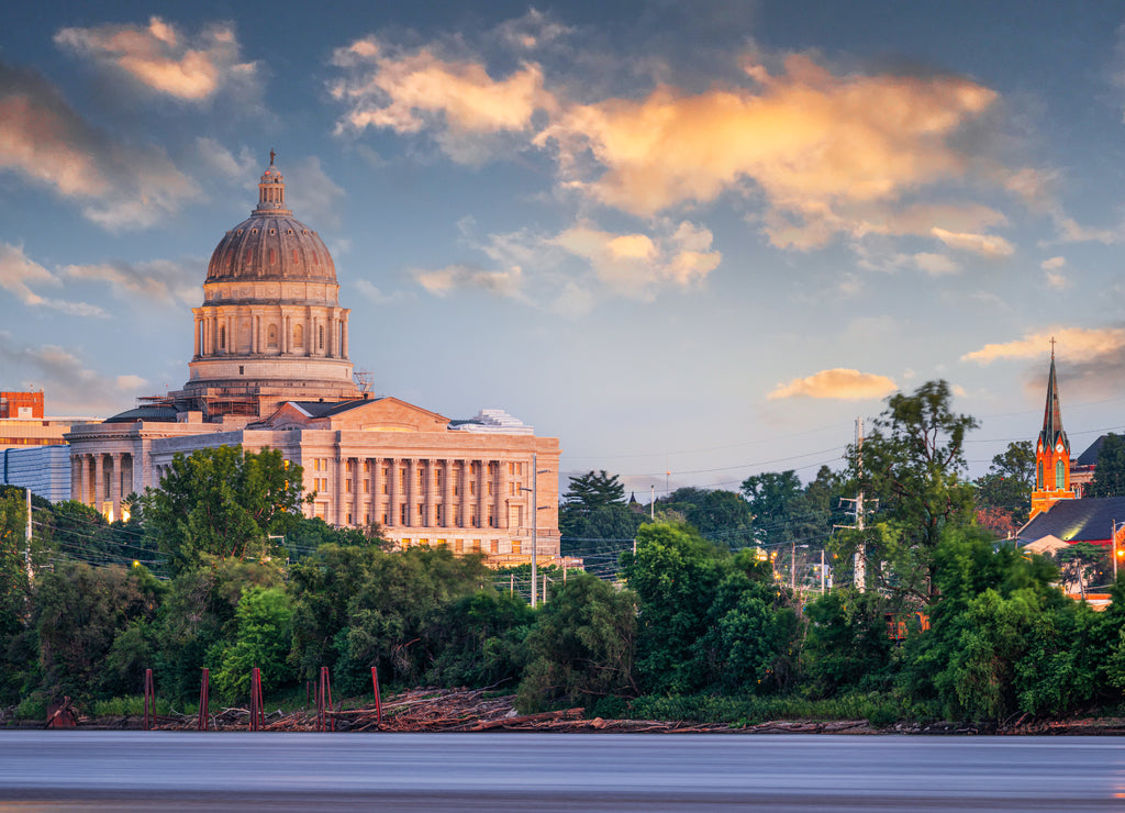 Jefferson City, Missouri, USA downtown view on the Missouri River with the State Capitol