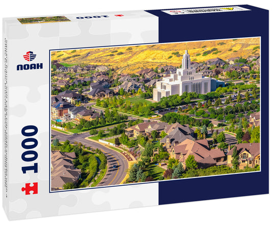 Square frame Salt Lake City Utah suburbs with a white temple towering over houses and roads