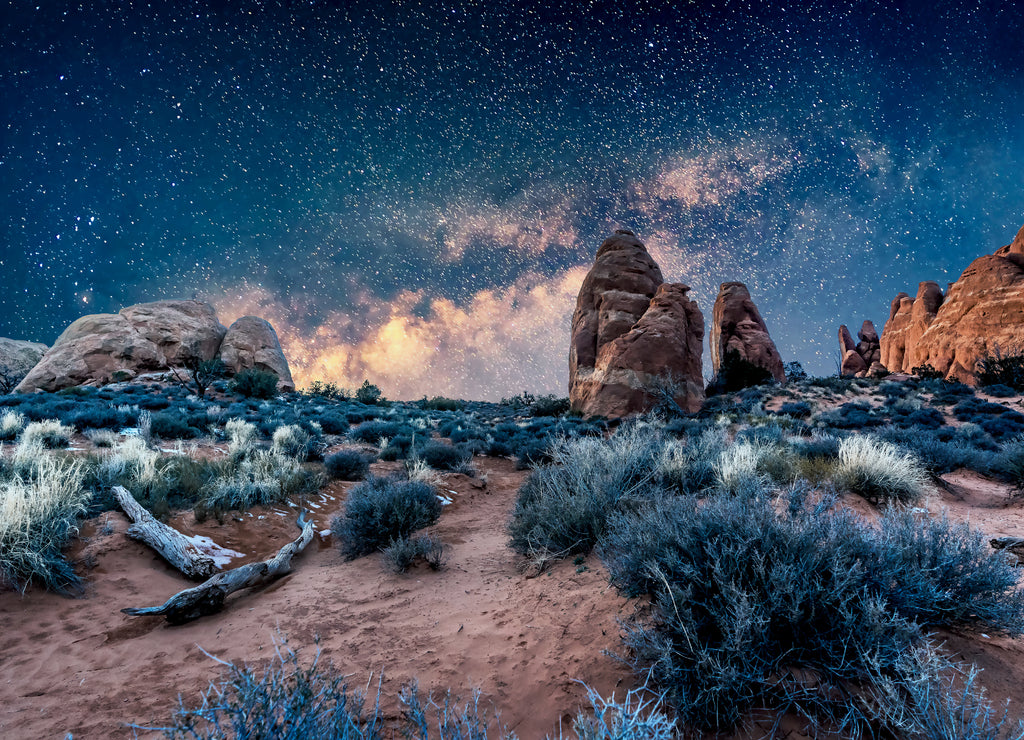 Arches National Park under a milky way star filled night sky in Moab, Utah USA