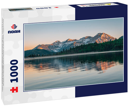 Mountains reflecting in Silver Lake Flat Reservoir at sunset, near the Alpine Loop Scenic Byway in American Fork Canyon, Uinta-Wasatch-Cache National Forest, Utah