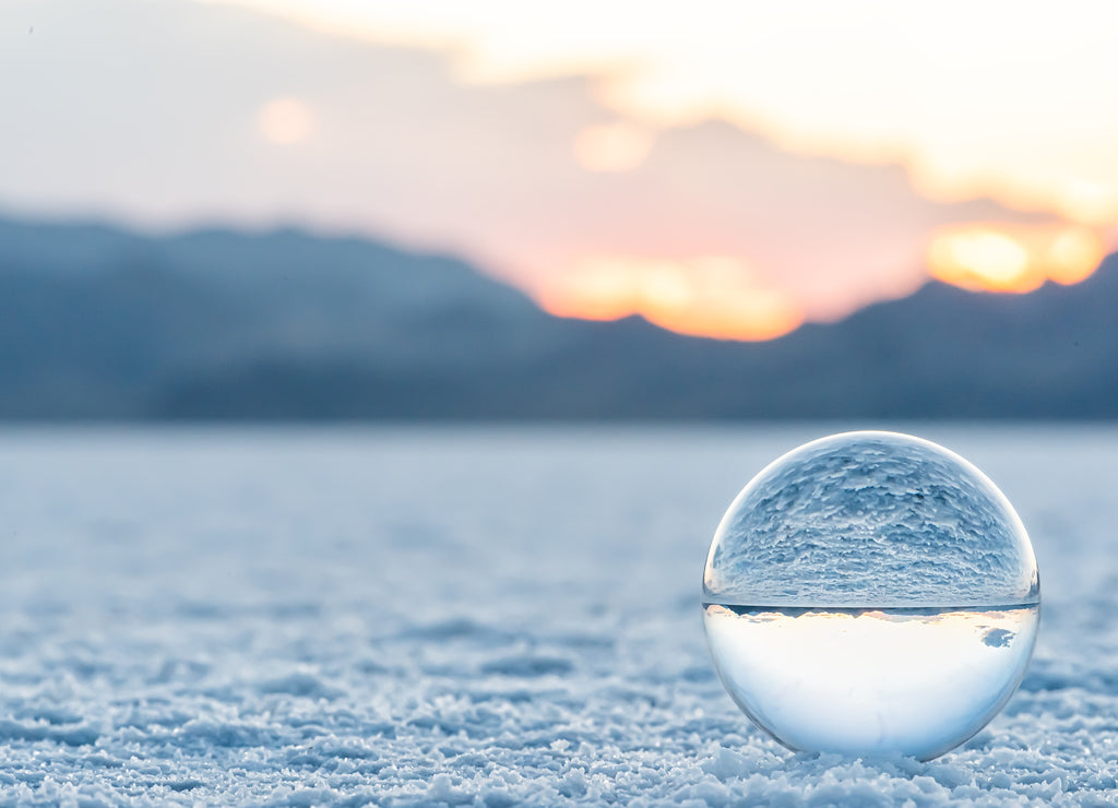 Bonneville Salt Flats low angle ground level landscape view near Salt Lake City, Utah and sand texture with crystal ball reflection