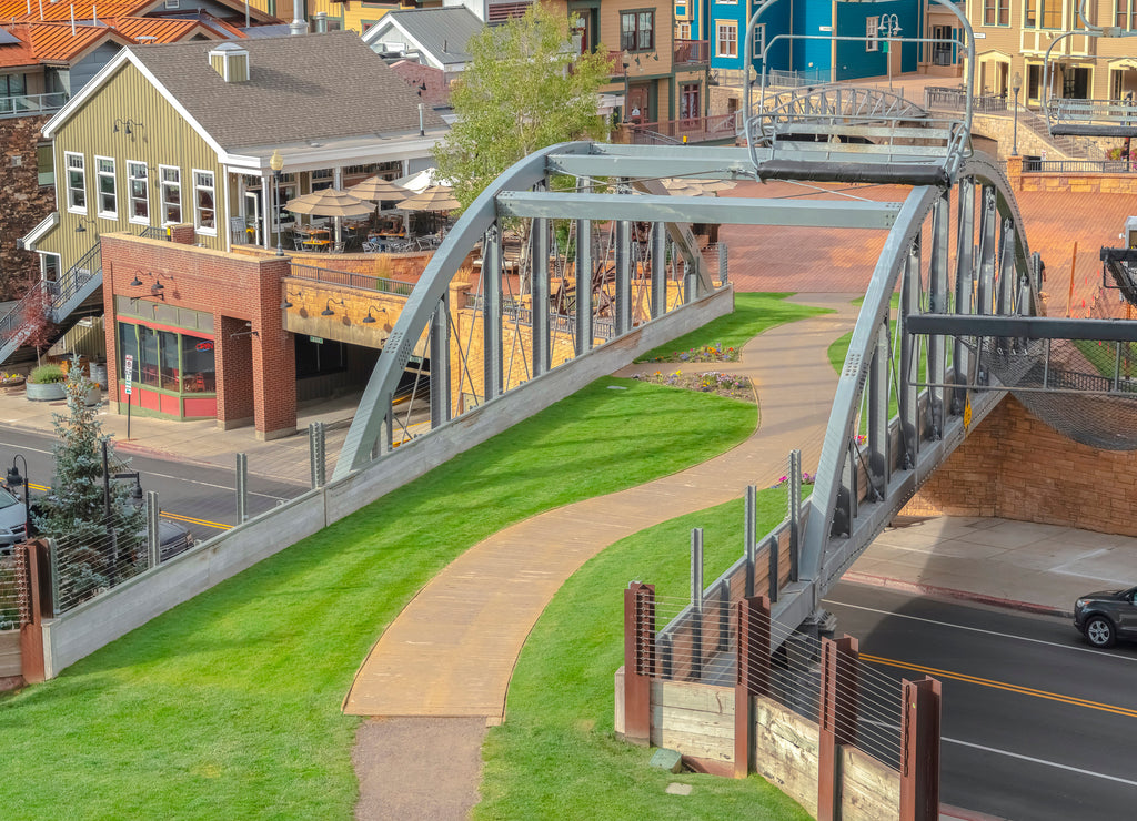 Off season views in Park City Utah with chairlifts and bridge over a road
