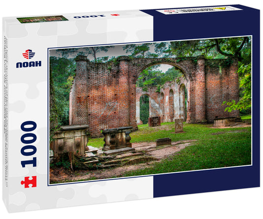 red brick skeleton of the Old Sheldon Church Ruins in Beaufort County, South Carolina with Spanish moss hanging from the surrounding trees