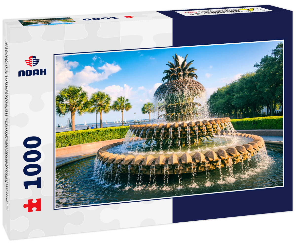 Scenic view of water streaming from a fountain in the shape of a pineapple on a blue sky afternoon at the waterfront in Charleston, South Carolina, USA