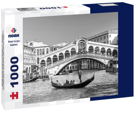 Noah Jigsaw Puzzle The city of Harnosand in north part of Sweden. Flowers and lake in foreground. Center in background in black white 1000 pieces