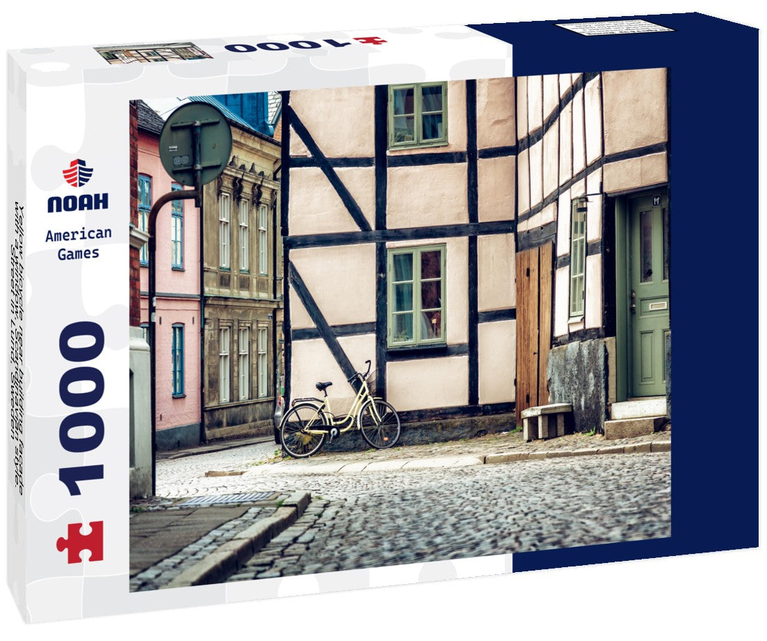 Noah Jigsaw Puzzle Yellow bicycle near building facade with a window, Scandinavian style. Street in Lund, Sweden 1000 pieces