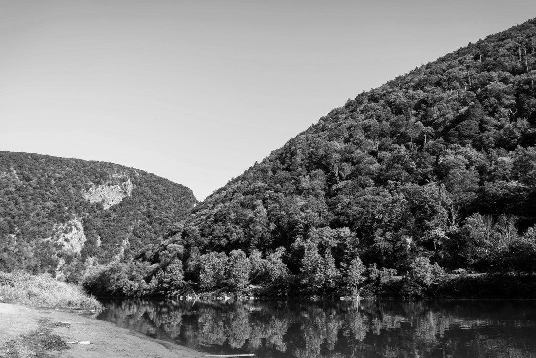 Delaware Water Gap is a water gap between New Jersey and Pennsylvania where the Delaware River cuts through a large ridge of the Appalachian Mountains. Delaware Water Gap National Recreation Area 2000pc PuzzleBlack and White