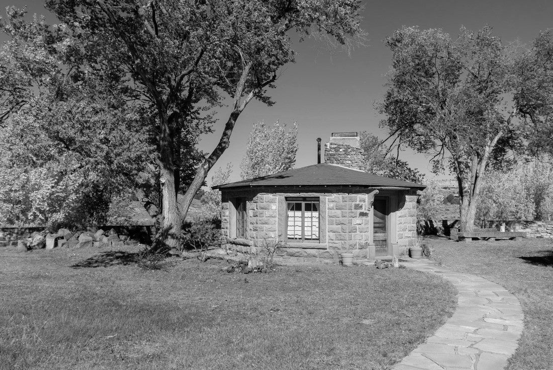 Hubbell Trading Post National Historic Site in Arizona. Hogan of logs and earth was the traditional Navajo housing. Octagon shaped hogan was used as a guest house for visitors, artist in residence 2000pc PuzzleBlack and White