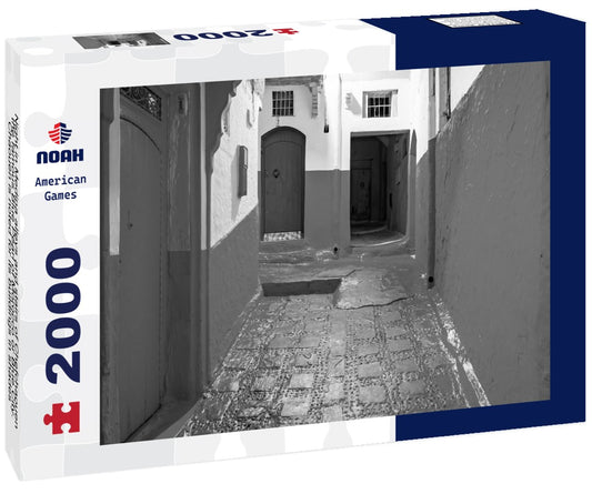 Noah Jigsaw Puzzle Night in Medina alleys and stairs of Chefchaouen, the famous Blue Pearl of Morocco or Blue City. Chaouen is noted for its buildings in shades of blue, UNESCO heritage in black white 2000 pieces