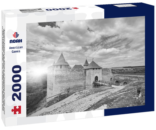 Noah Jigsaw Puzzle Ancient fortress in Khotyn in morning sun with mist, West Ukraine. Majestic fortification on the banks of the Dniester River, one of the most famous and largest castles in Ukraine in black white 2000 pieces